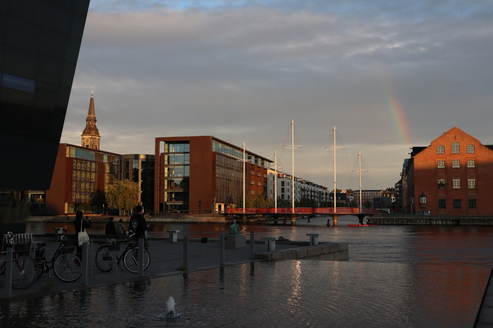 A rainbow peeks over the south of Copenhagen.