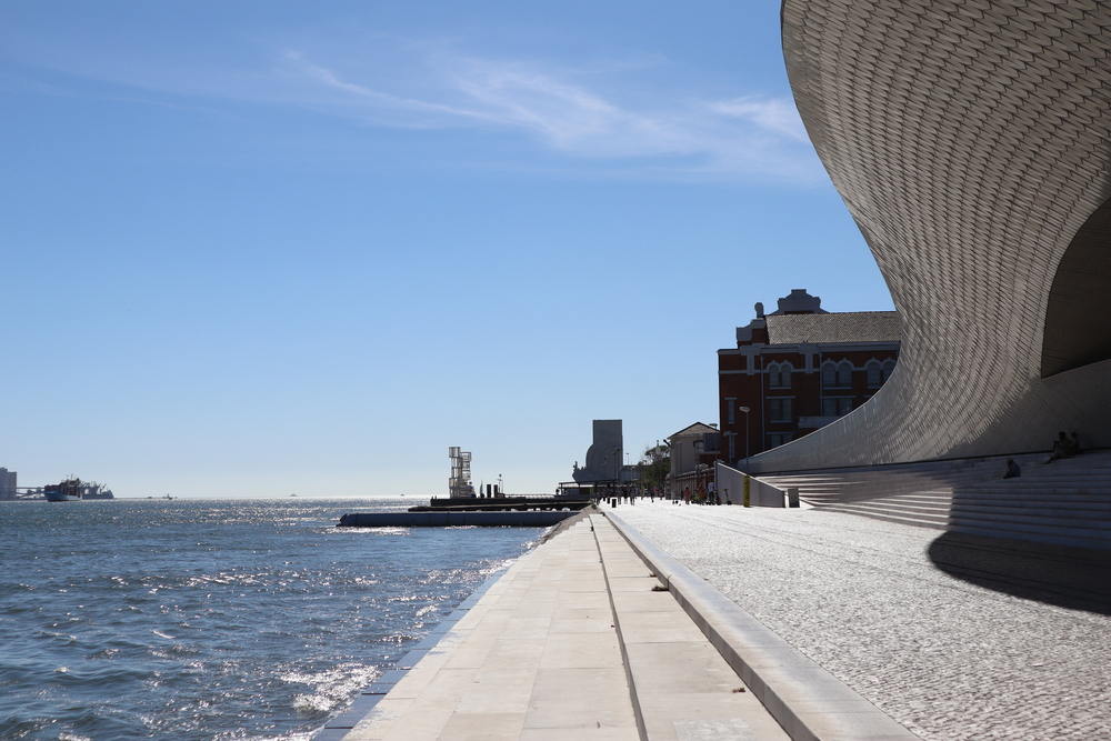 A modern structure by the coast.