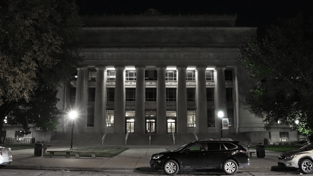 Mason Hall at night.